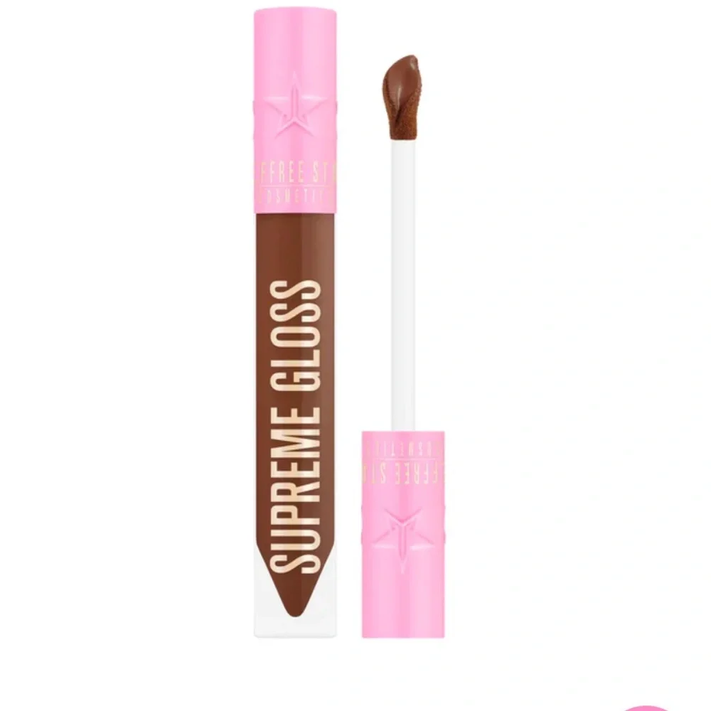 97. Jeffree Star DOMINATRIX Supreme Gloss Dark Brown Lip Gloss